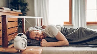 man sleeping in bed oRytPC.width .jpg