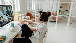 woman wokring from home CrPRAq.width .jpg