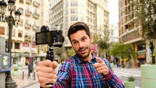 Person outdoors recording a video of himself .width .jpg
