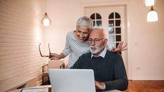 couple computer digital payment older.jpg