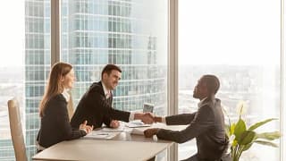 employee shaking hands with bosses RJKQsE.width .jpg