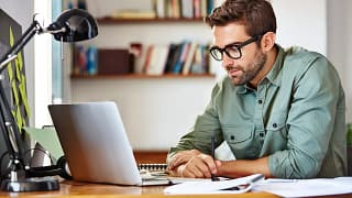 man s glasses laptop gettyimages .jpg