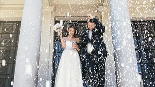 newly married couple holding hands and walkin.width JbBaG.jpg