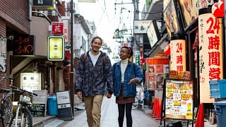 two people walking on street in tokyo uPbWw.width .jpg