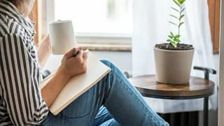 woman with notebook and coffee.width .jpg