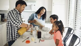 young family eating breakfast.width .jpg