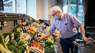 Older man shopping at grocery store CODDjp.width .jpg
