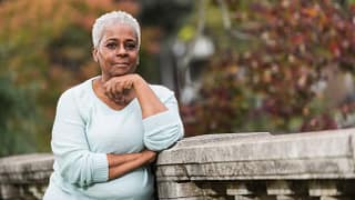 getty thoughtful older person outside at the park.jpg