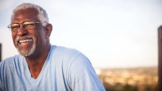 man s smiling outdoors gettyimages .jpg