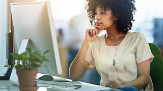 office worker looking at computer screen.jpg