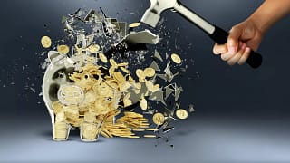 person smashing piggy bank with hammer.jpg