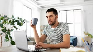 young investor sitting at desk.jpg