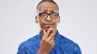getty fingers on chin looking up thinking considering wondering.jpg