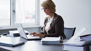middle aged woman laptop gettyimages .jpg