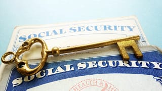 social security cards key fix cpi retirement age payroll tax getty.jpg
