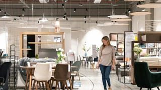 woman in furniture store ZMdRBh.width .jpg