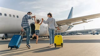 family vacation plane travel suitcase luggage.width .jpg