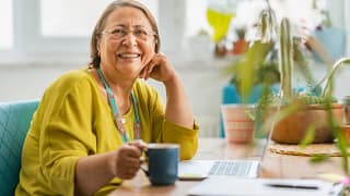 person sitting at a desk and smiling.jpg