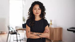 getty arms crossed strong serious expression thinking wondering.jpg