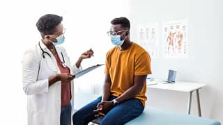 doctor and patient in exam room UdTAfov.width .jpg