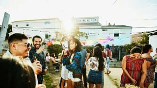 friends at backyard barbecue crUUD.width .jpg