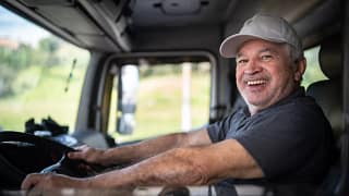 getty smiling happy truck driver.jpg