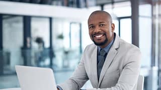man s business suit laptop gettyimages .jpg