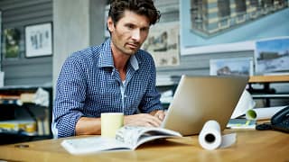 man s laptop concentrating gettyimages .jpg