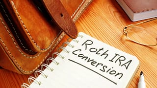 gettyimages roth ira conversion notebook retirement plan.jpg