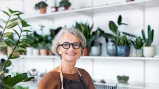 person smiling in a flower shop.jpg