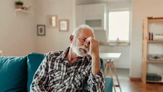 older man couch headache gettyimages .jpg