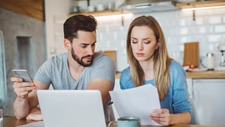 young couple looking over finances at home.jpg
