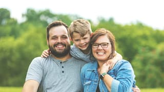 getty family with one kid in park.jpg