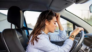 stressed person sitting in car.jpg