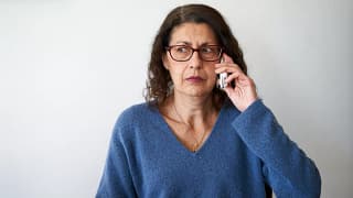 confused person using cell phone.jpg