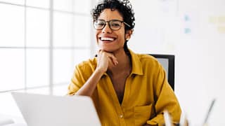 woman s laptop smiling gettyimages .jpg