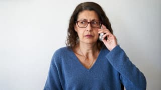confused person using cell phone.jpg