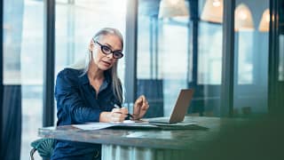 gettyimages older woman working retirement.jpeg