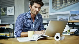 man s laptop concentrating gettyimages .jpg