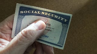 social security card benefit check cola recipient getty.jpg