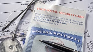 social security card cash money retire benefit tax statement getty.jpg
