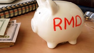 Should You Take Your First RMD in 2026 or Wait Until April 2027? The Tax Trade-Off Explained