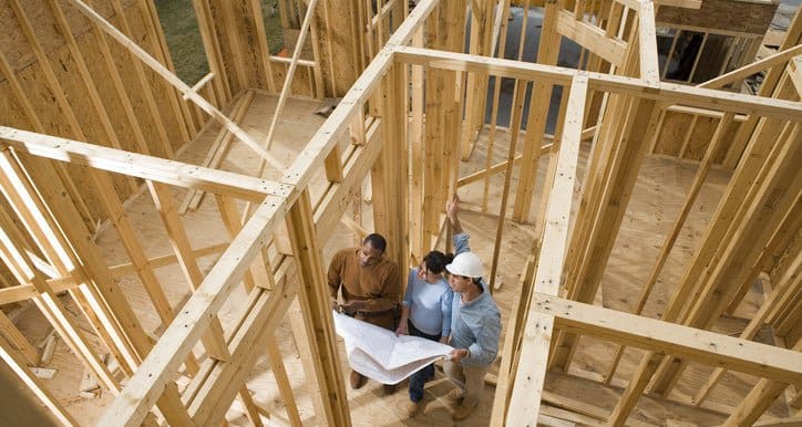 couple with architect in house under construc.width RSmacdW.jpg