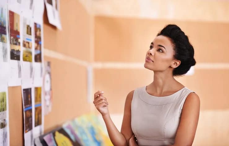 woman in office looking thoughtful fjpkE.width .jpg