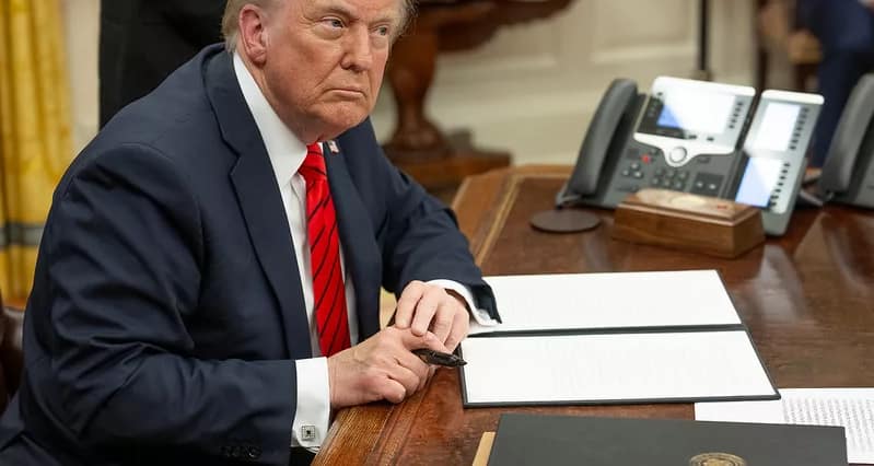 us government work president donald trump signing executive order.jpg