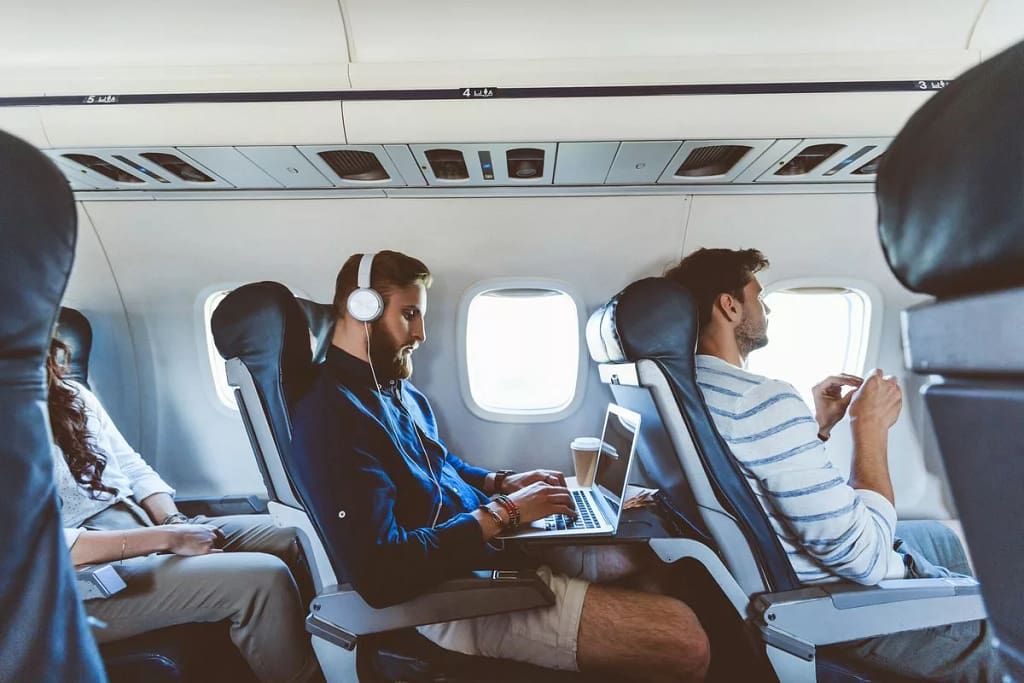 airplane passengers XnPe.width .jpg