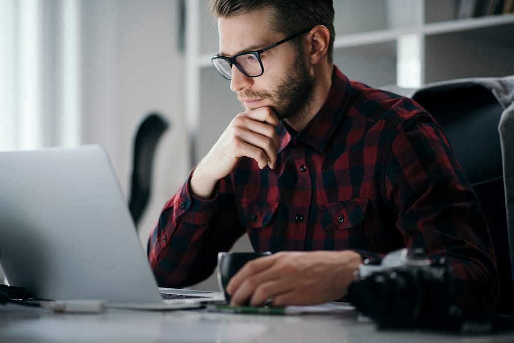 man s at desk serious gettyimages .jpg