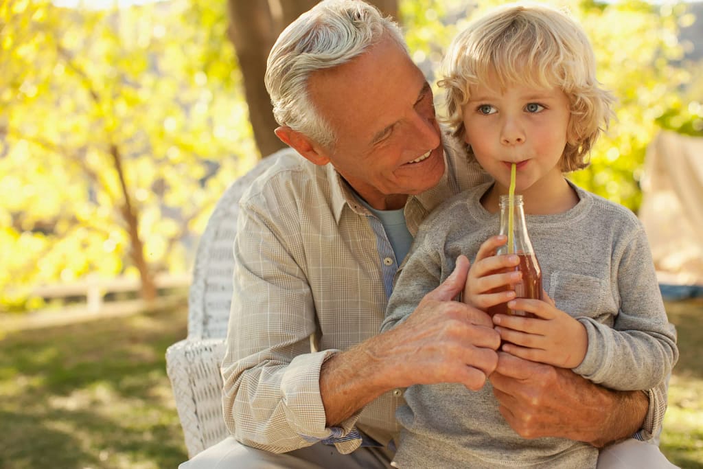getty grandparent and child yellow background.jpg