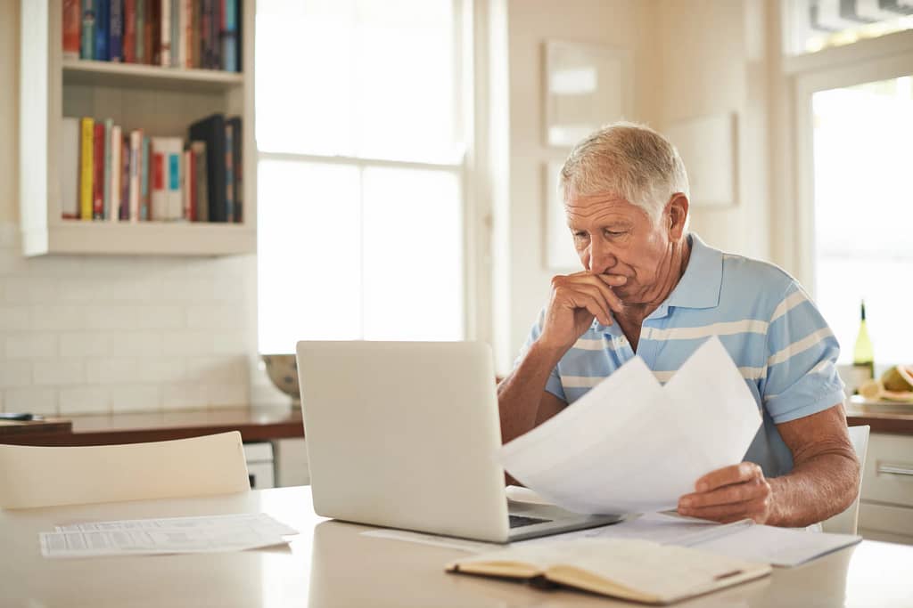 senior man laptop stressed gettyimages .jpg