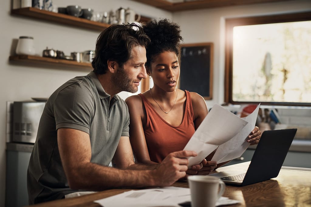 couple looking at financial papers.jpg